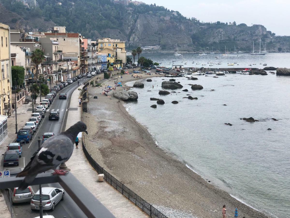 Taormina Wonderful Solarium Apartment จีอาร์ดีนี นักซอส ภายนอก รูปภาพ